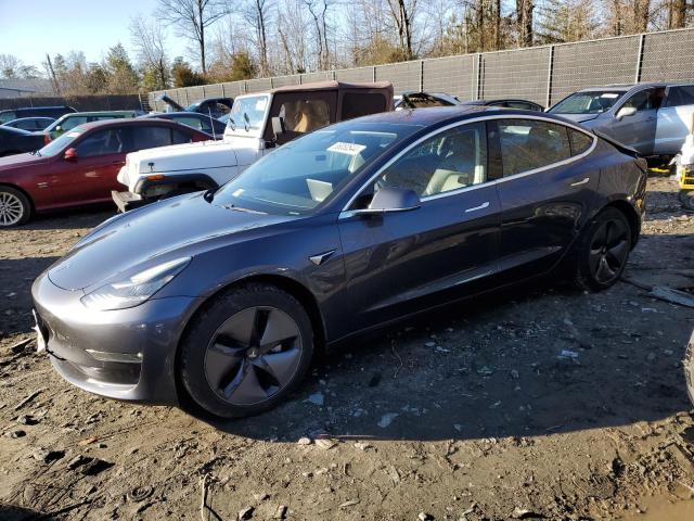 TESLA MODEL 3 2017 with VIN 5YJ3E1EA6HF000040 - Photo from auction