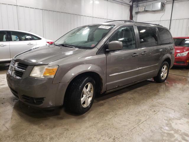 DODGE GRAND CARA 2010 with VIN 2D4RN5D17AR317003 - Photo from auction