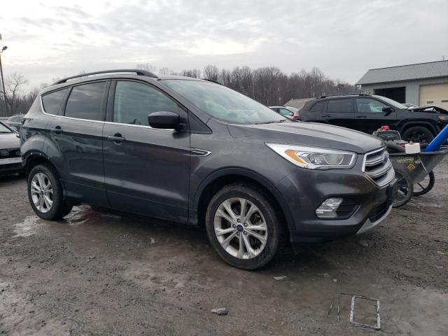 Photo 4 from auction – 2017 FORD ESCAPE SE with VIN 1FMCU9GD0HUD48301