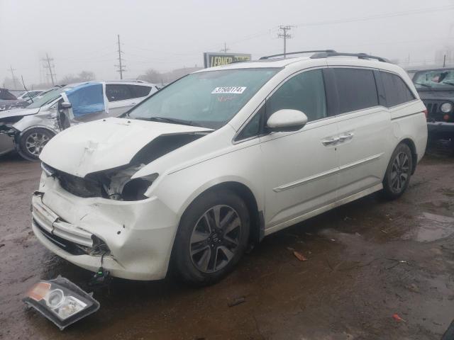 HONDA ODYSSEY TO 2014 with VIN 5FNRL5H91EB028459 - Photo from auction