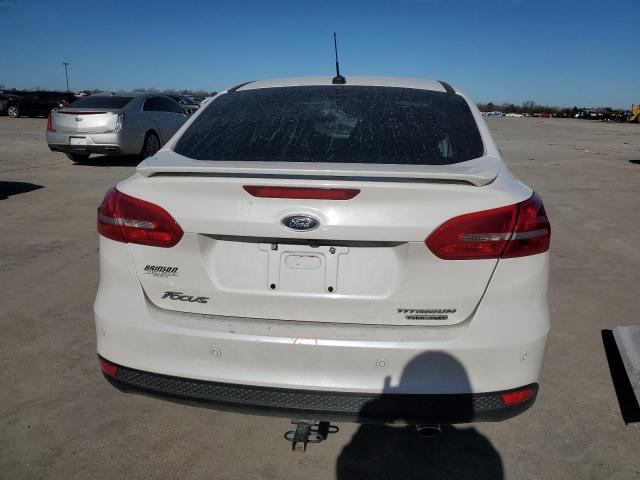 Photo 6 from auction – 2016 FORD FOCUS TITA with VIN 1FADP3J28GL336671