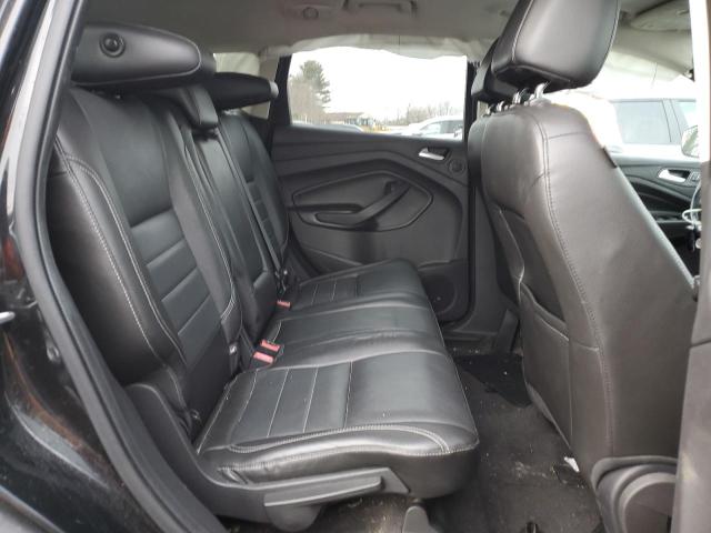 Photo 11 from auction – 2014 FORD ESCAPE TIT with VIN 1FMCU0J96EUE05659