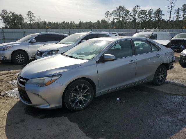 TOYOTA CAMRY LE 2017 with VIN 4T1BF1FK1HU675099 - Photo from auction