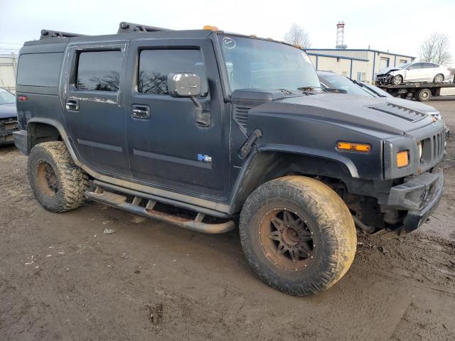 Photo 4 from auction – 2003 HUMMER H2 with VIN 5GRGN23U23H125189
