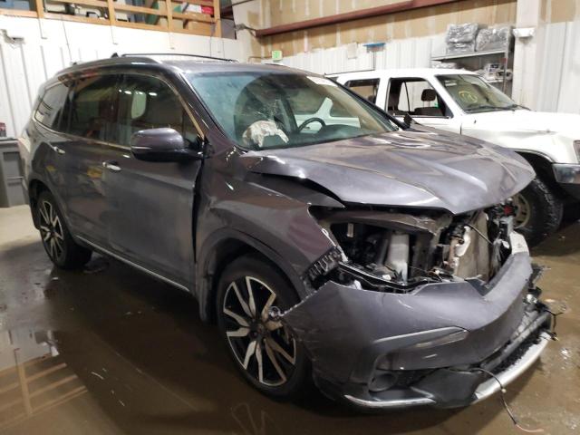 Photo 4 from auction – 2022 HONDA PILOT TOUR with VIN 5FNYF6H91NB016367