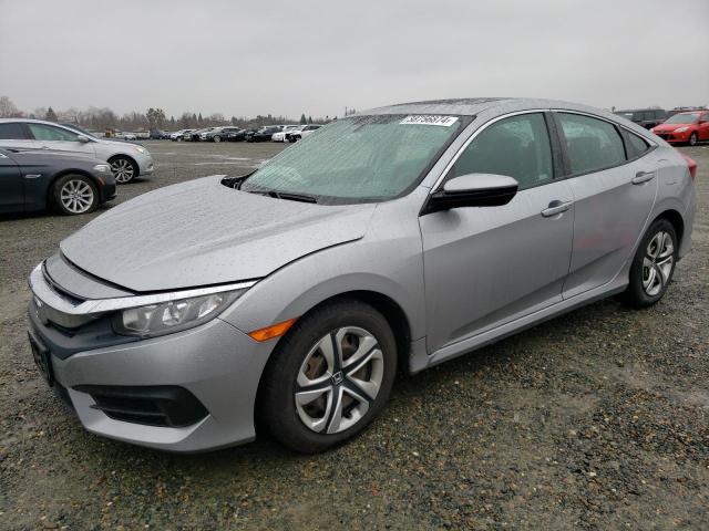 HONDA CIVIC EX 2018 with VIN 2HGFC2F7XJH574279 - Photo from auction