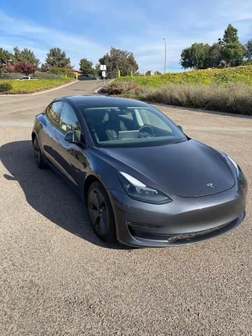 TESLA MODEL 3 2023 with VIN 5YJ3E1EA0PF574907 - Photo from auction