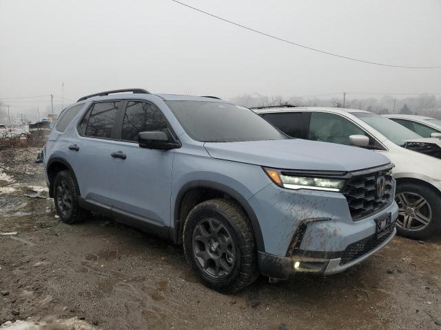 Photo 4 from auction – 2023 HONDA PILOT TRAI with VIN 5FNYG1H68PB050265