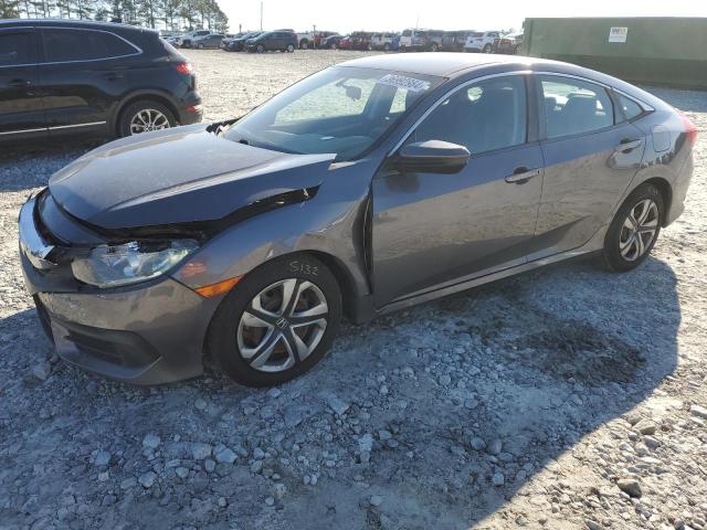 HONDA CIVIC LX 2018 with VIN 2HGFC2F50JH559174 - Photo from auction