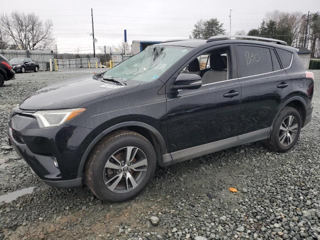 Photo 1 from auction – 2017 TOYOTA RAV4 XLE with VIN 2T3WFREV0HW378165