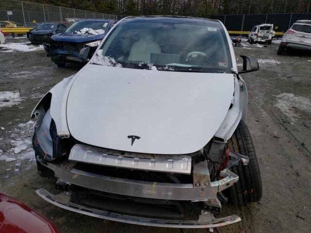 Photo 5 from auction – 2022 TESLA MODEL Y with VIN 7SAYGDEF8NF311173
