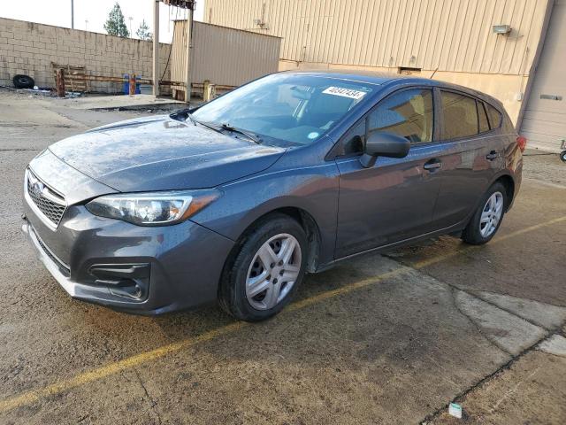 SUBARU IMPREZA 2019 with VIN 4S3GTAA6XK3720423 - Photo from auction
