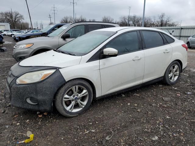 FORD FOCUS SE 2014 with VIN 1FADP3F28EL228623 - Photo from auction