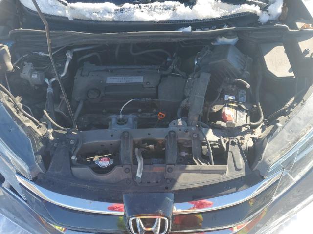 Photo 11 from auction – 2015 HONDA CR-V EX with VIN 2HKRM4H54FH692956
