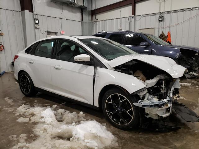 Photo 4 from auction – 2014 FORD FOCUS SE with VIN 1FADP3F27EL240858