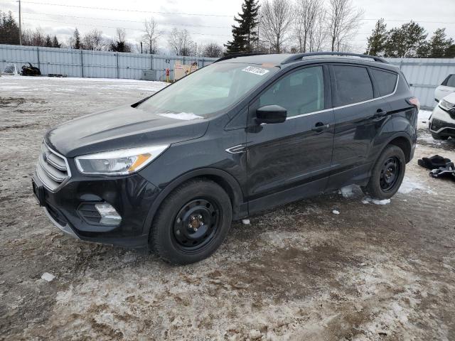 FORD ESCAPE SE 2018 with VIN 1FMCU0GD5JUC42542 - Photo from auction