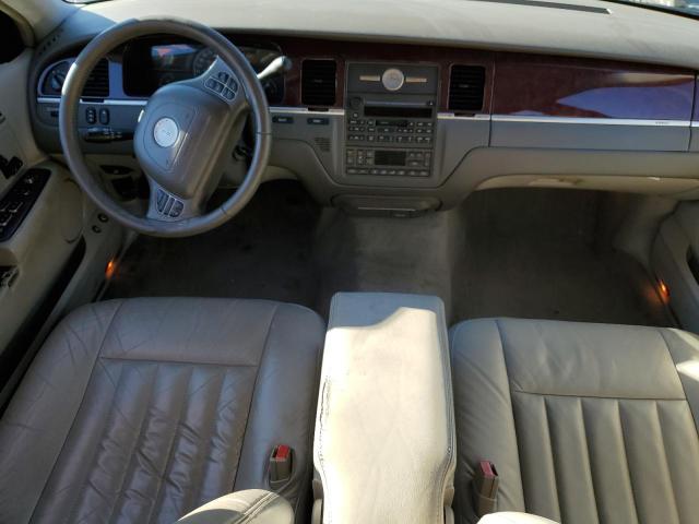 Photo 8 from auction – 2004 LINCOLN TOWN CAR E with VIN 1LNHM81W34Y674090