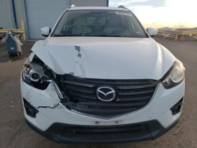 Photo 5 from auction – 2016 MAZDA CX-5 GT with VIN JM3KE2DY4G0785176