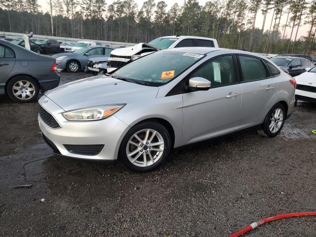 FORD FOCUS SE 2016 with VIN 1FADP3F28GL320267 - Photo from auction