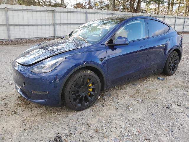 TESLA MODEL Y 2023 with VIN 7SAYGDEE7PF762900 - Photo from auction