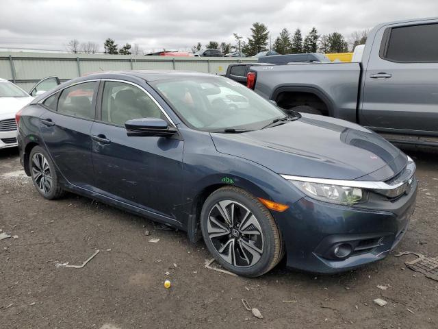 Photo 4 from auction – 2018 HONDA CIVIC EX with VIN JHMFC1F32JX014045
