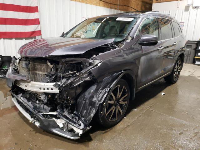 HONDA PILOT TOUR 2022 with VIN 5FNYF6H91NB016367 - Photo from auction