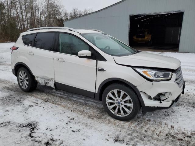Photo 4 from auction – 2018 FORD ESCAPE TIT with VIN 1FMCU9J94JUC42511