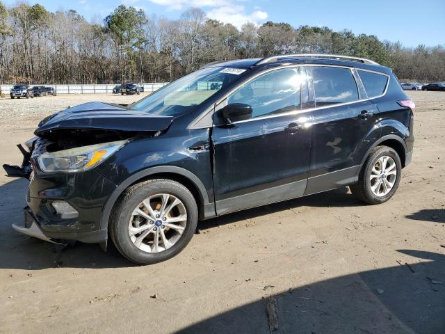 FORD ESCAPE SE 2018 with VIN 1FMCU0GD4JUA36712 - Photo from auction