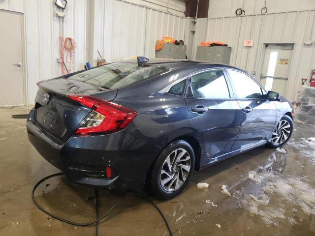 Photo 3 from auction – 2018 HONDA CIVIC EX with VIN 19XFC2F75JE033800