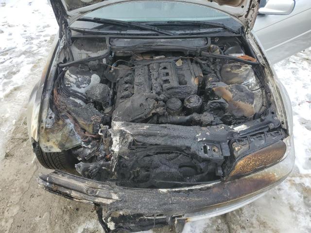 Photo 11 from auction – 2003 BMW 325 CI with VIN WBABN33473PG62499