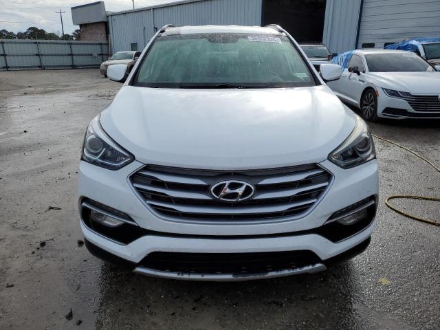 Photo 5 from auction – 2017 HYUNDAI SANTA FE S with VIN 5NMZU3LB2HH017307