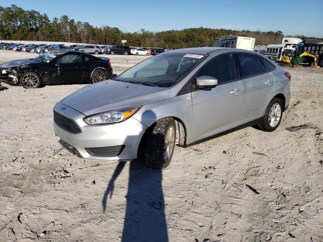 FORD FOCUS SE 2018 with VIN 1FADP3F27JL298771 - Photo from auction