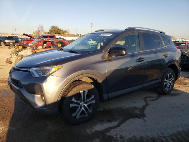 TOYOTA RAV4 LE 2018 with VIN JTMBFREV3JJ252997 - Photo from auction