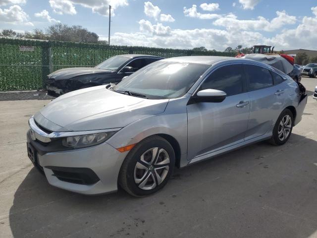 HONDA CIVIC LX 2017 with VIN 19XFC2F55HE069432 - Photo from auction