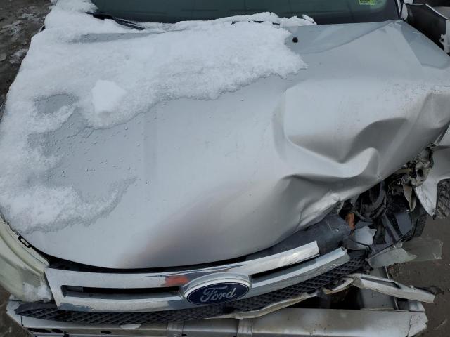 Photo 11 from auction – 2011 FORD FOCUS SE with VIN 1FAHP3FN7BW130382