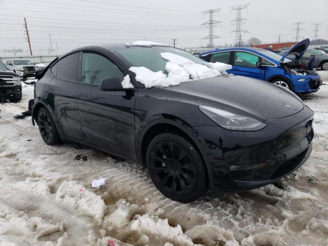 Photo 4 from auction – 2023 TESLA MODEL Y with VIN 7SAYGAEE3PF668673