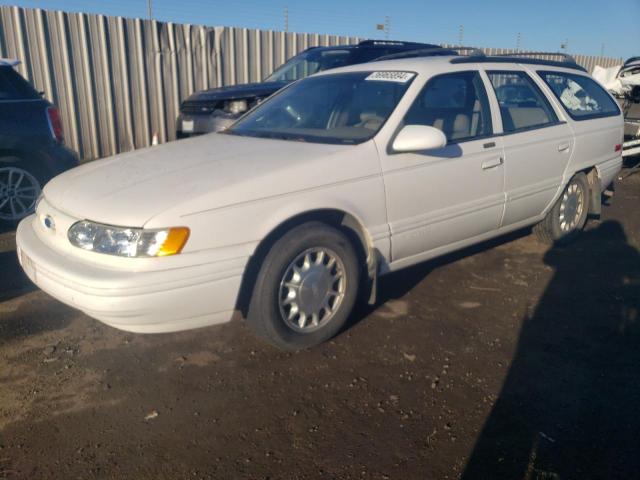 FORD TAURUS LX 1994 with VIN 1FALP5841RG127511 - Photo from auction