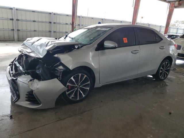 TOYOTA COROLLA 2017 with VIN 5YFBURHE3HP592027 - Photo from auction