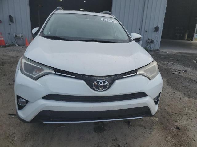 Photo 5 from auction – 2016 TOYOTA RAV4 XLE with VIN JTMWFREV8GJ072232