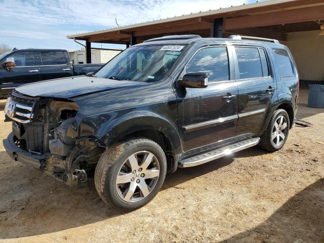 HONDA PILOT TOUR 2012 with VIN 5FNYF4H98CB044927 - Photo from auction