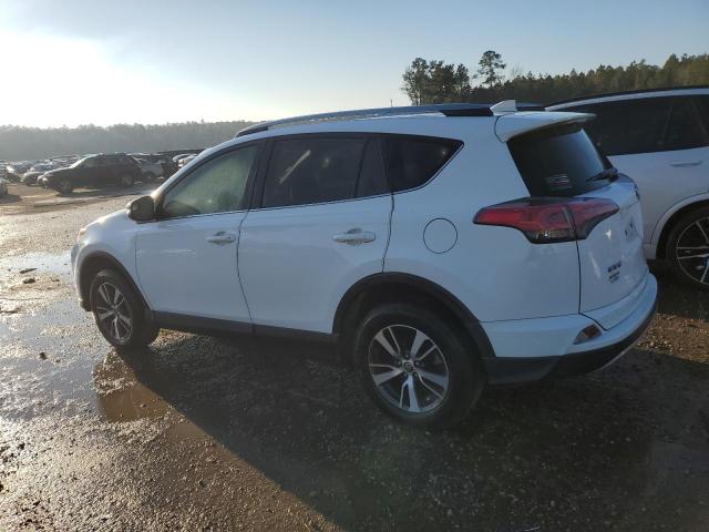 Photo 2 from auction – 2017 TOYOTA RAV4 XLE with VIN JTMWFREV0HJ108691