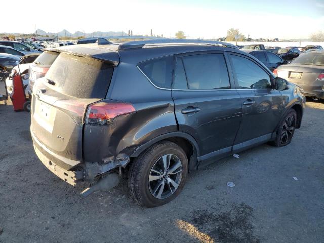 Photo 3 from auction – 2017 TOYOTA RAV4 XLE with VIN 2T3WFREV6HW321050