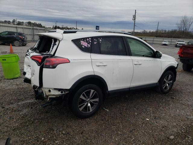 Photo 3 from auction – 2017 TOYOTA RAV4 XLE with VIN JTMWFREV5HD093233