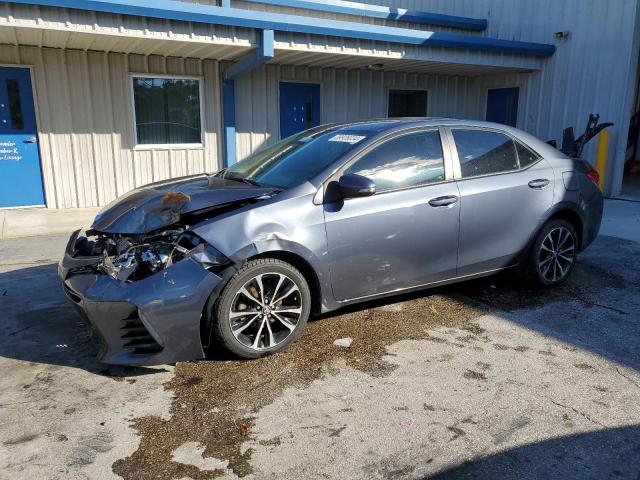TOYOTA COROLLA L 2019 with VIN 5YFBURHE0KP889487 - Photo from auction