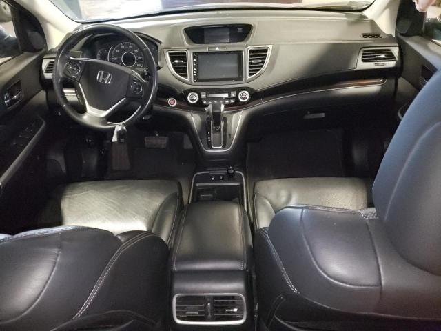 Photo 8 from auction – 2016 HONDA CR-V EXL with VIN 2HKRM3H71GH527363