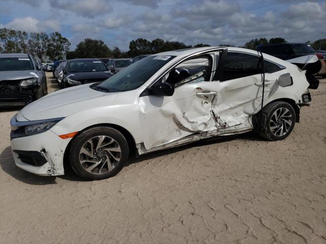 HONDA CIVIC EX 2018 with VIN 19XFC2F78JE207035 - Photo from auction