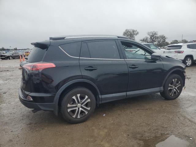 Photo 3 from auction – 2018 TOYOTA RAV4 LE with VIN 2T3ZFREV1JW450462