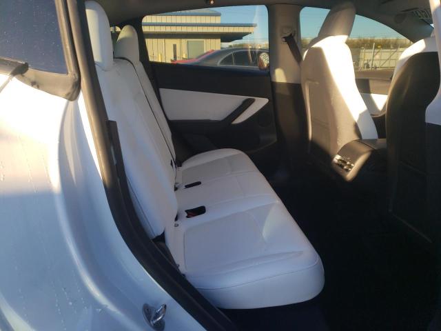 Photo 11 from auction – 2022 TESLA MODEL Y with VIN 7SAYGDEFXNF494253