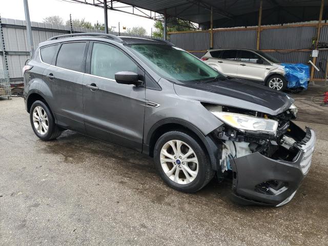 Photo 4 from auction – 2018 FORD ESCAPE SE with VIN 1FMCU0GDXJUA60898