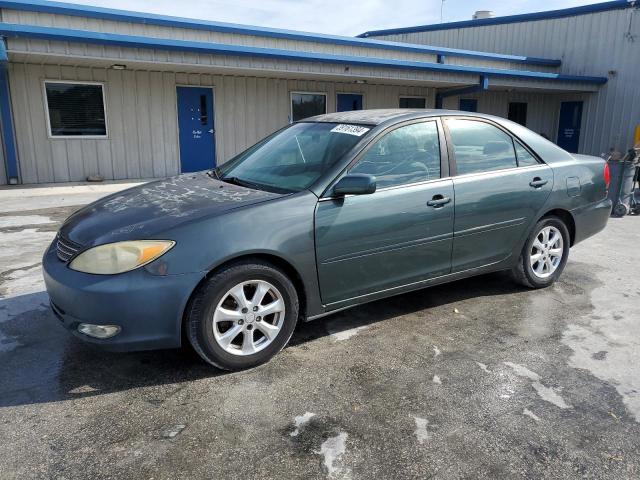 TOYOTA CAMRY LE 2002 with VIN JTDBE32K820078037 - Photo from auction